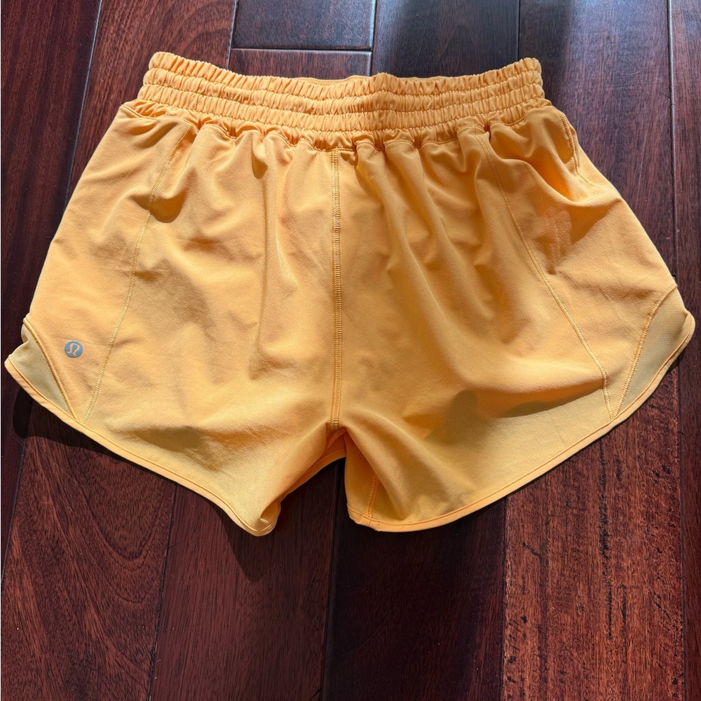Selling Lululemon shorts size 6 in orange color - Picture 2 of 9